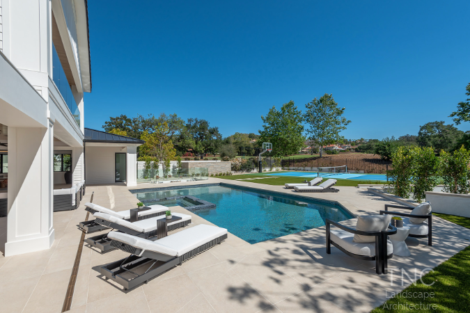 Luxury Living project overall backyard, pool, and patio view