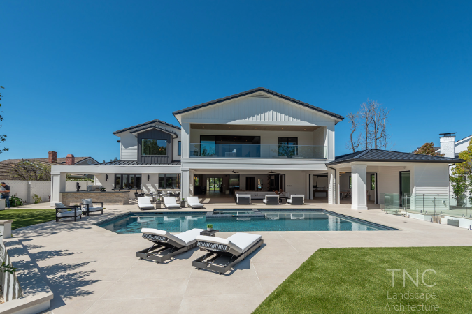 Luxury Living project overall pool and rear home view